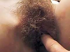 Hot brunette teen amateur gets her hairy pussy fingered on bed